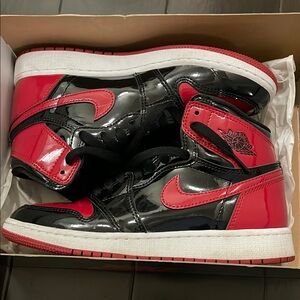 Jordan 1 Retro High OG (GS size 5.5 ) Women’s size 7 Black and Red patent.